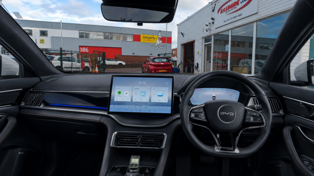 Interior cockpit view of the BYD Seal U DM-i AWD showcasing luxury features for SUV hire Preston customers